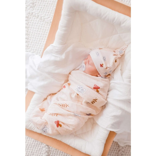 Our Raccoon Organic Swaddle Wrap & Beanie is made from the finest quality cotton, light weight breathable muslin which is ultra soft, highly absorbent and quick drying. Raccoon Organic Swaddle Wrap & Beanie features a playful design and are the most beautiful wraps for birth announcement outfits