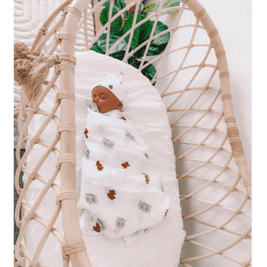 Our Raccoon White Organic Swaddle Wrap & Beanie is made from the finest quality cotton, light weight breathable muslin which is ultra soft, highly absorbent and quick drying. Raccoon White Organic Swaddle Wrap & Beanie features a playful design and are the most beautiful wraps for birth announcement outfits.