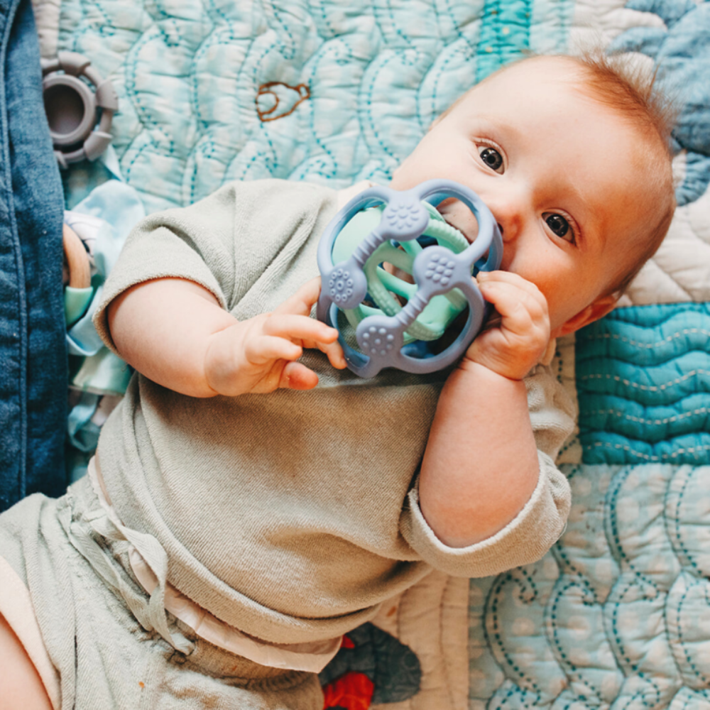 The Jellystone Designs Sensory Ball is a teether and toy rolled into one. Designed for all ages and stages, the Sensory Ball functions as both a teether for young babies as well as a sensory toy for older children.