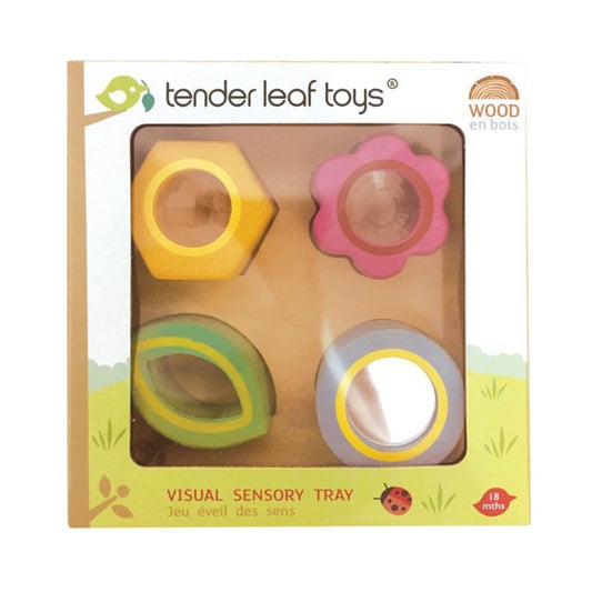 The Tender Leaf Toys Visual Sensory Tray is a wooden shape sorter with a difference! There are 4 solid wooden shapes on a shape sorter tray, and each block has a window so that your child can see the world in different ways. Each shape has a different visual play aspect. Great for building sensory awareness and fine motor skill