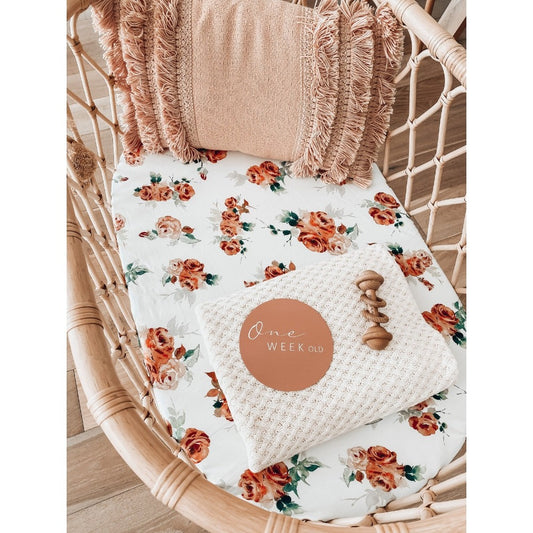 Snuggle Hunny Kid's Rosebud Fitted Bassinet Sheet can also be used as a Change Pad Cover and is made from snuggly soft stretch cotton jersey. Comes with a matching drawstring bag which can be used for other multi-purposes.