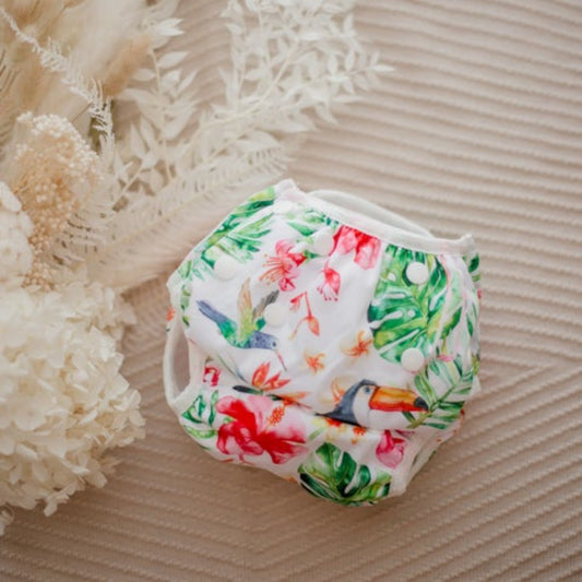 Our reusable Tropical Oasis Swimming Nappy have been designed and created with simplicity but effectiveness in mind. All of our reusable products feature high quality fabrics and materials which have been ethically sourced and made. We have been working alongside Australian artists for many years, to bring you beautifully crafted and unique designs.